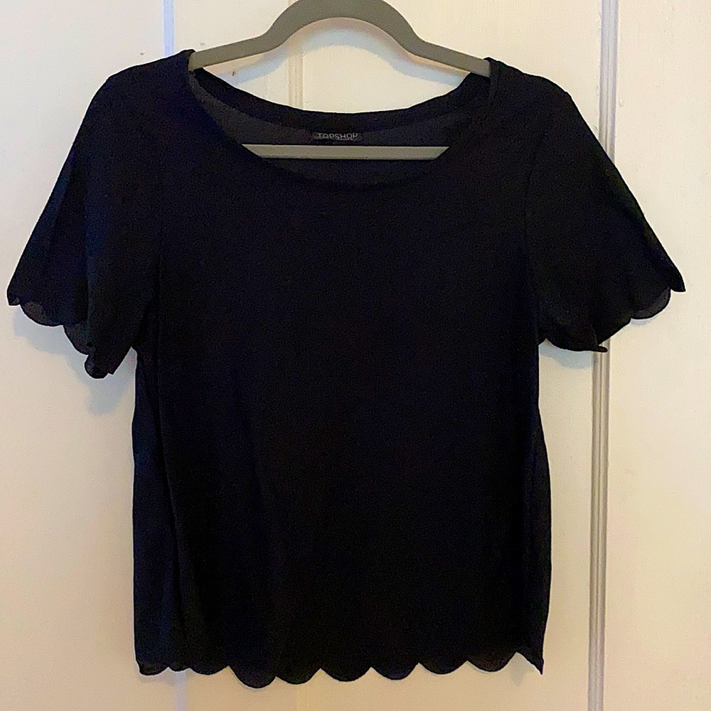 black short sleeve top with scalloped hem